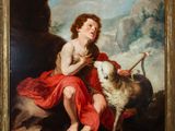 an oil painting of a young boy with a goat in a rocky landscape