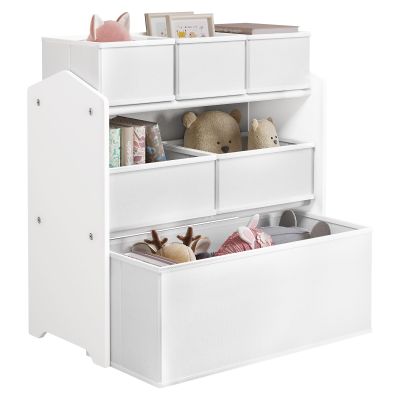 un gros plan sur un meuble de rangement pour jouets avec un ours en peluche