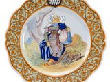 a plate with a picture of a man and a woman on it