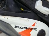 a close up view of a pair of skis with a sticker on it