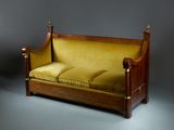 a couch that is sitting in the middle of a room