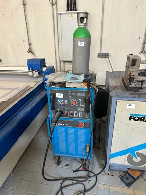 a picture of a machine that is working on a piece of wood