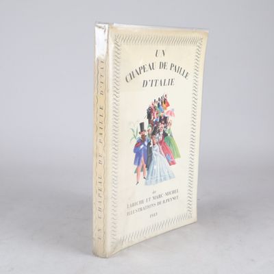 un livre ouvert sur lequel figure la photo d'un groupe de personnes