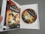 a dvd in a white case with a picture of a bird hunting game