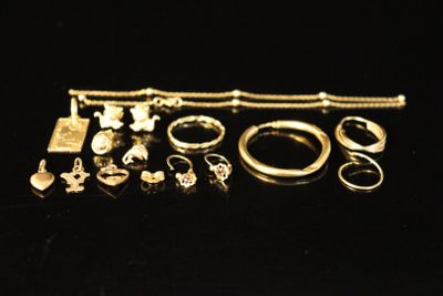 a close up of a bunch of rings and bracelets on a table