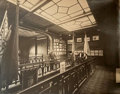 a black and white photo of a bar in a building