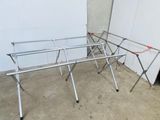 an image of a clothes drying rack in a garage