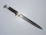 a knife that is laying on top of a table