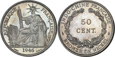 a silver coin with the image of a woman sitting on top of it