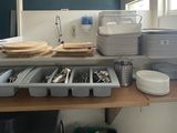 a table with many items on it in a room