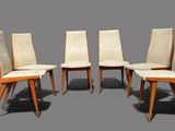 set of four mid century dining chairs with upholstered seats