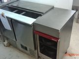 a stainless steel counter top with a sink and a dishwasher in it