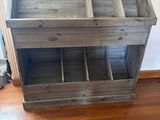 a picture of a wooden table with a wine rack on it