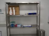 an image of a bathroom with a sink and a shelf