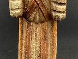 an image of a statue of a woman holding a baby