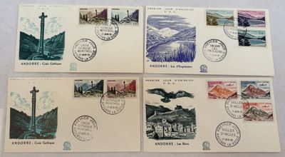 four different stamps on a table with a bird flying over them