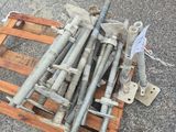 a pile of screws and bolts on a pallet