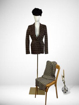 an image of a mannequin and a chair with a hat on top of it