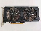 the graphics card has two fans attached to it ' s back