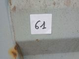 a close up of a number on the side of a building