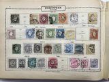 an old book with a bunch of stamps on it