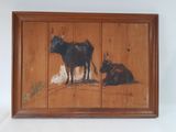 une photo d'un tableau représentant une vache et une vache couchée