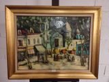 une photo d'un tableau représentant une scène de rue, dans un cadre doré