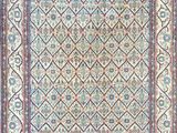 a rug with a blue and red design on it