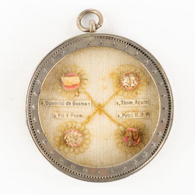 a picture of a pocket watch with a picture on it