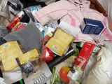 a pile of items in a plastic bag on the floor