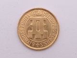 l'image d'une pièce d'or sur laquelle figure le chiffre 4
