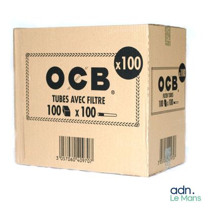 une boîte de tubes OCB posée sur une surface blanche