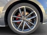 a close up view of a car ' s wheel and tire