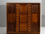 an image of a wooden cabinet with many doors and drawers