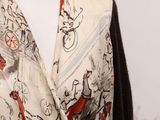 a dress on a mannequin with a horse and carriage design