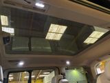 a view of the inside of a vehicle with the sunroof