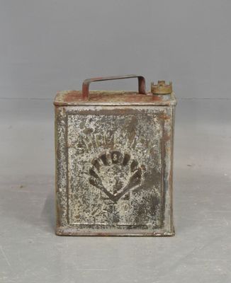 a small metal box with a skull and crossbone design on it
