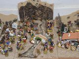 many figurines that are sitting on a table