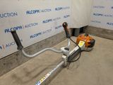 an image of a lawn mower in a garage