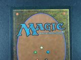 the back cover of a card game with a picture of a circle