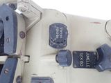 a close up of a sewing machine with a lot of buttons on it