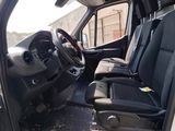 a picture of the inside of a van with the driver ' s seat up