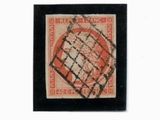 un vieux timbre sur lequel figure une carte