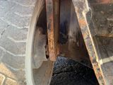 a close up of a wheel on a construction vehicle