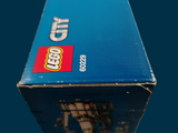 a blue box with a picture of a building on it