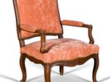 une image représentant une chaise dont l'assise est recouverte d'un tissu orange