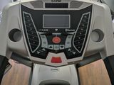 a close up of a tread machine in a gym