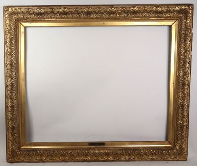 a gold framed mirror with a white background