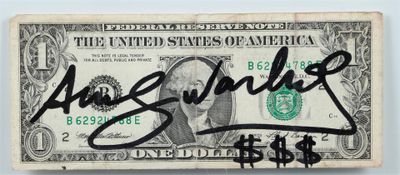 an image of a one dollar bill with a signature on it