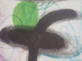 a picture of a painting with a green ball on top of it